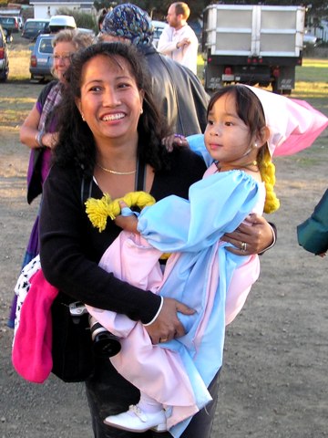 Mom carrying a Princess